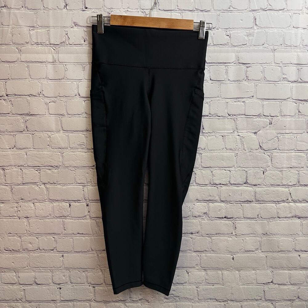 Athleta Interval Stash 7/8 Tights Black Women's Small Pockets Workout Gym